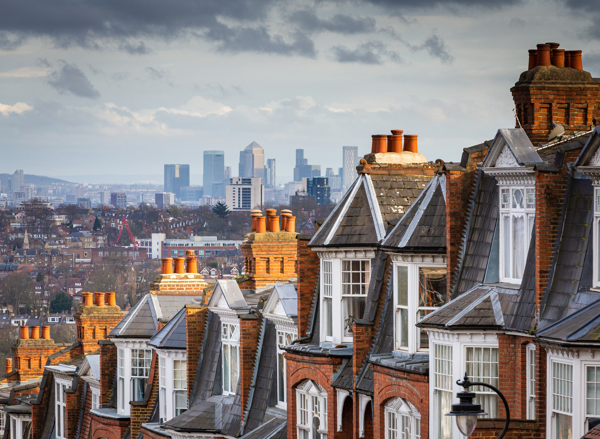 Terrace houses with London skyline in the background